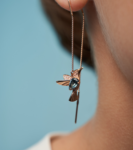 Rose gold hummingbird threader earring with blue gemstone